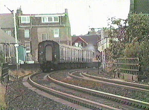 Red striped ScotRail Class 47 on Postal at St Vincent Street