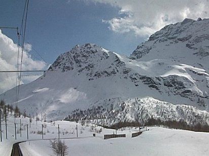 Rtische Bahn Bernina Express in th Alps