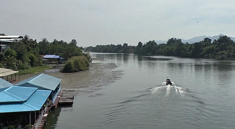 Crossing the  Khwae Noi at Tamarkan, Thailand